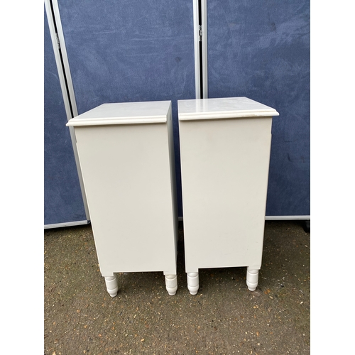 246 - A matching pair of bedside tables. 

Dimensions - 11