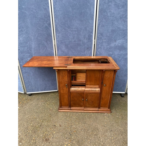 247 - Mid century teak sewing machine table and upholstered stool. 

Please see images for dimensions.