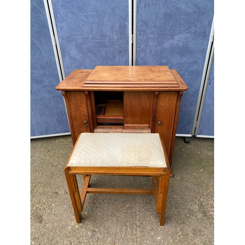 247 - Mid century teak sewing machine table and upholstered stool. 

Please see images for dimensions.