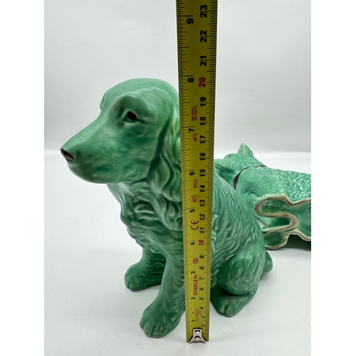 5 - Two 20th century green Sylvac ceramic dog ornaments - 20cm