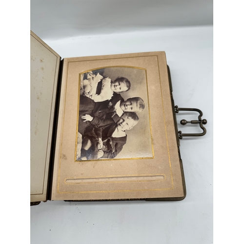 17 - Quantity of 19th century leather bound photograph albums with family portraits + 1709 Bible