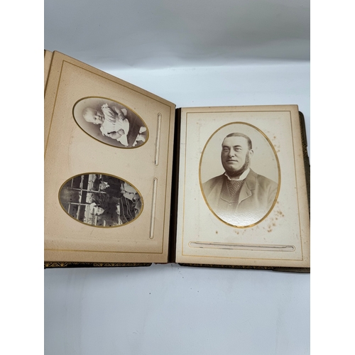 17 - Quantity of 19th century leather bound photograph albums with family portraits + 1709 Bible