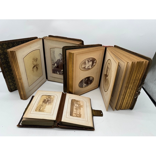 17 - Quantity of 19th century leather bound photograph albums with family portraits + 1709 Bible