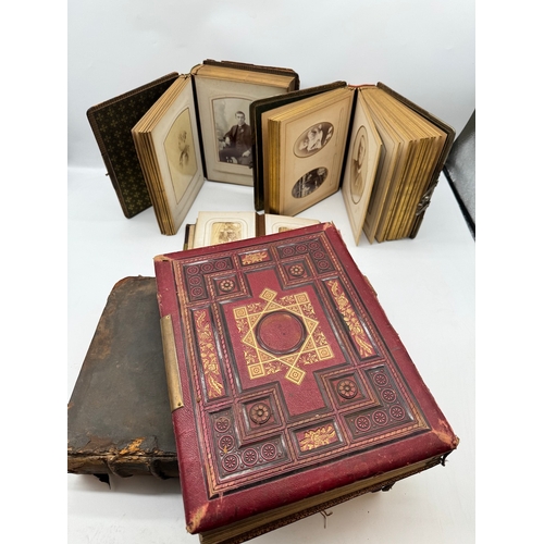 17 - Quantity of 19th century leather bound photograph albums with family portraits + 1709 Bible