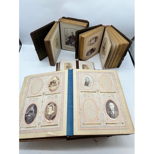 17 - Quantity of 19th century leather bound photograph albums with family portraits + 1709 Bible