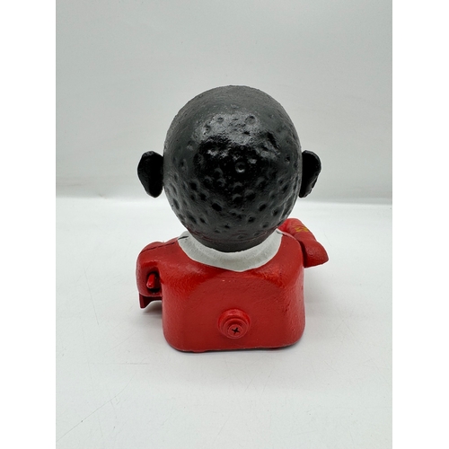 24 - Cast metal novelty money bank