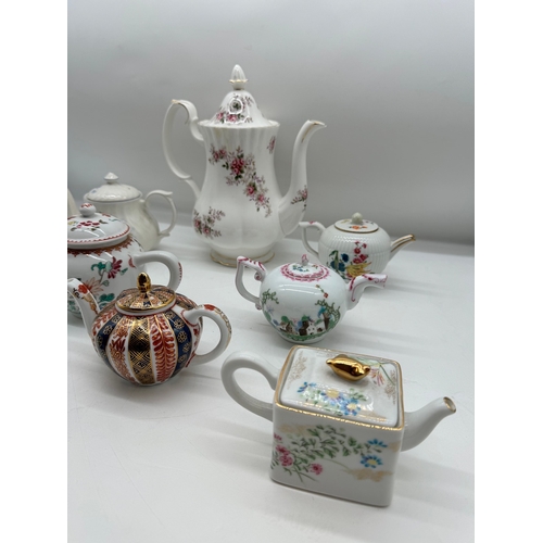 45 - Lot of Eight Collectable Tea Pots