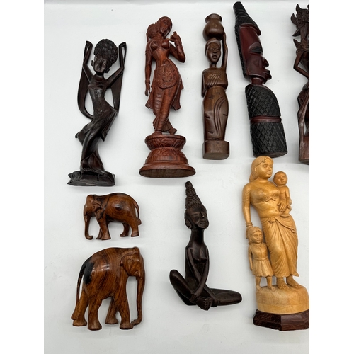 58 - Qunaity of carved wooden African / Asian figures