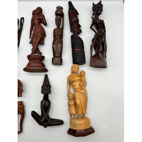 58 - Qunaity of carved wooden African / Asian figures