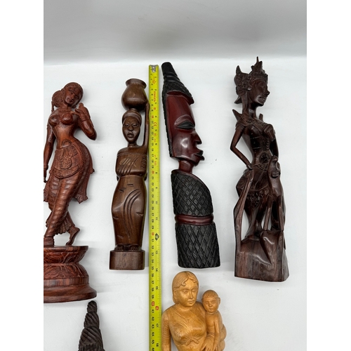 58 - Qunaity of carved wooden African / Asian figures