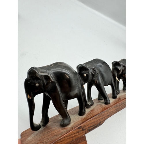 61 - Collection of carved African Wood / Bone Elephants