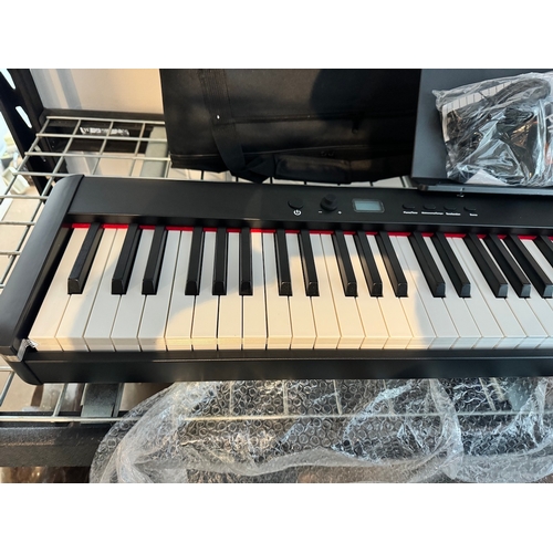 81 - Brand new Horse Electrical Piano with case