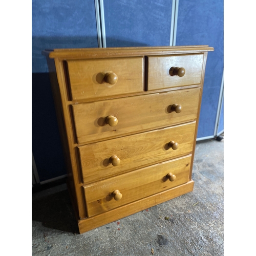 304 - Pine two over three drawer chest of drawers

Dimensions - 18