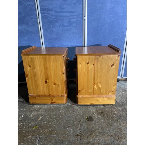 313 - A pair of pine bedside tables. 

Dimensions - 24