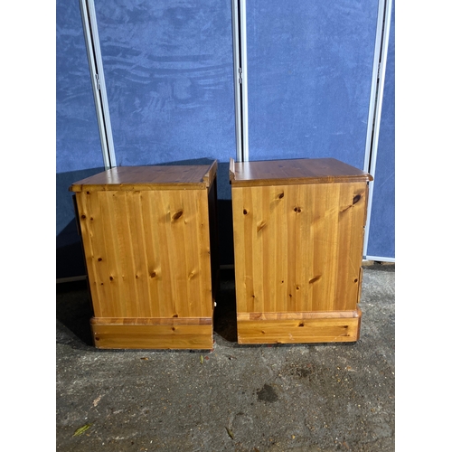 313 - A pair of pine bedside tables. 

Dimensions - 24