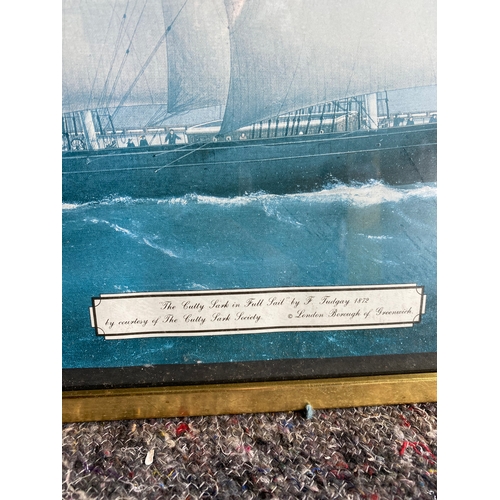 342 - A print of a boat and a collection of framed cards.