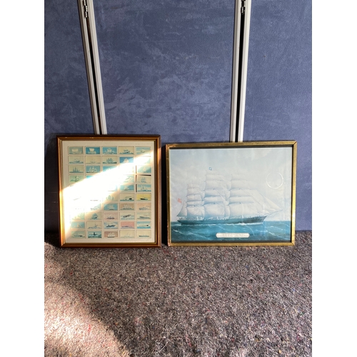 342 - A print of a boat and a collection of framed cards.