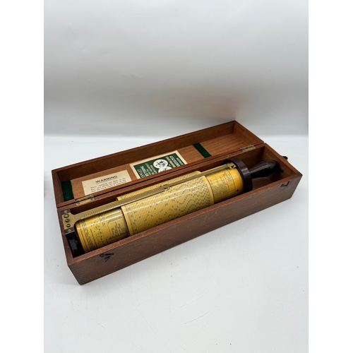 148 - Vintage Fuller's Calculator. An English, Bakelite and mahogany cased scientific instrument by Stanle... 