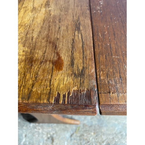 213 - Mid century drop leaf table.

Please see images for dimensions.