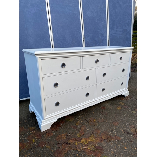 Solid sideboard in white by John Lewis. 

Dimensions - 59" x 20" x 32" approx