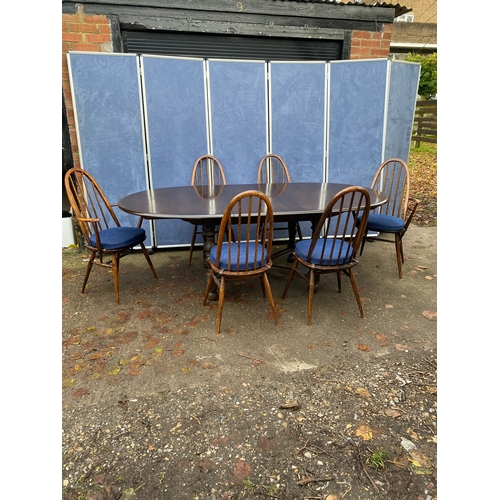 254 - Extendable Ercol dining table and Six chairs. 

Please see images for all dimensions.