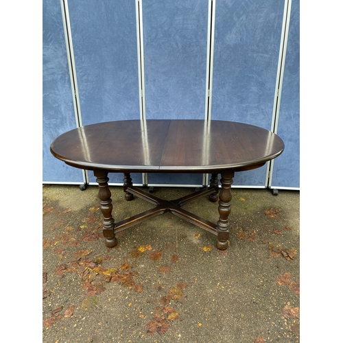 254 - Extendable Ercol dining table and Six chairs. 

Please see images for all dimensions.