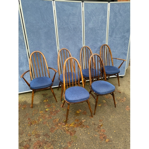 254 - Extendable Ercol dining table and Six chairs. 

Please see images for all dimensions.