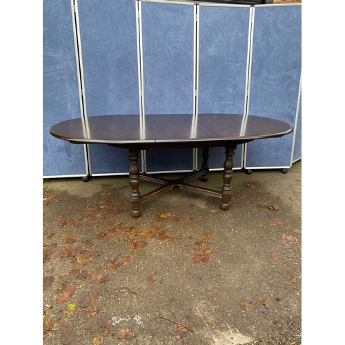 254 - Extendable Ercol dining table and Six chairs. 

Please see images for all dimensions.