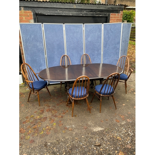 254 - Extendable Ercol dining table and Six chairs. 

Please see images for all dimensions.