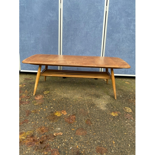 255 - Ercol coffee table. 

Dimensions - 42