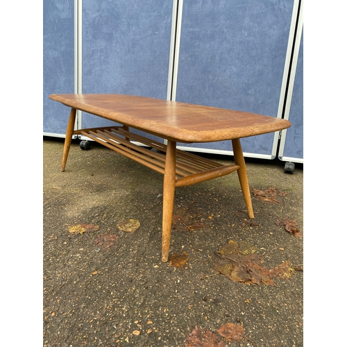 255 - Ercol coffee table. 

Dimensions - 42