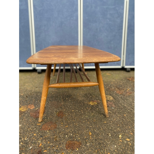 255 - Ercol coffee table. 

Dimensions - 42