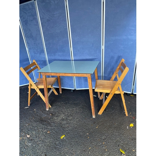 259 - Retro formica table with two foldable chairs. 

Dimensions - 36