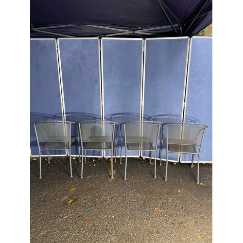 494 - A set of four tub style metal garden chairs