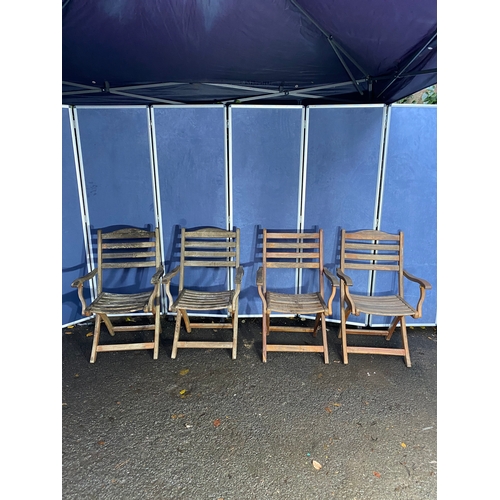 503 - A set of four Alexander rose Teak foldable garden chairs with circular Teak garden table and parasol... 