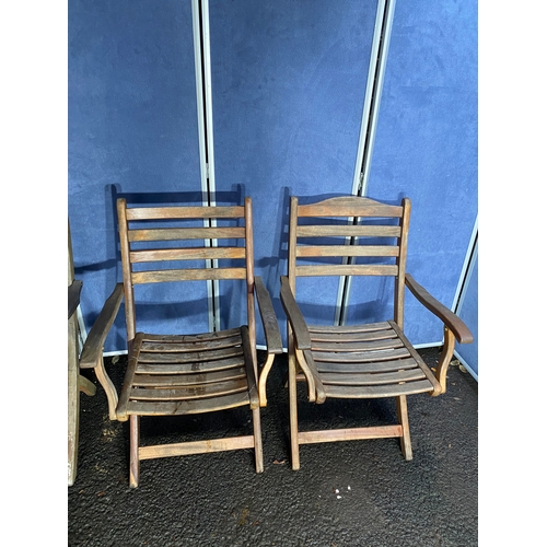 503 - A set of four Alexander rose Teak foldable garden chairs with circular Teak garden table and parasol... 