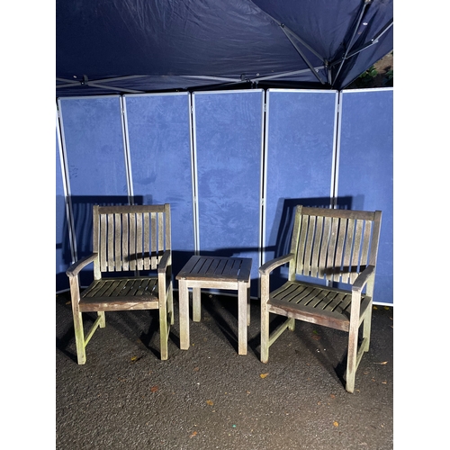 507 - A pair of Teak Indian ocean garden chairs and side table. 

Please see images for all dimensions.