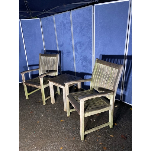 507 - A pair of Teak Indian ocean garden chairs and side table. 

Please see images for all dimensions.