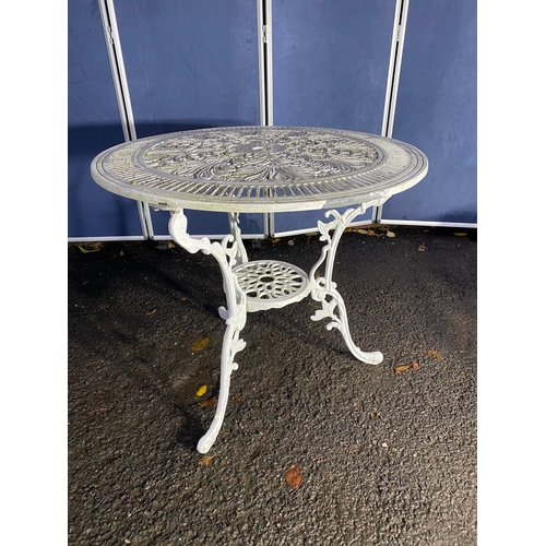 508 - Vintage White painted cast garden table and four chairs.