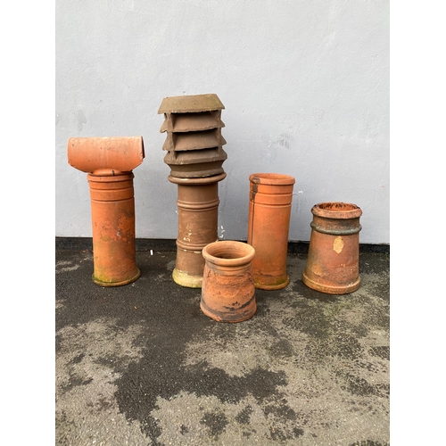 523 - Mixed selection of terracotta chimney pots.