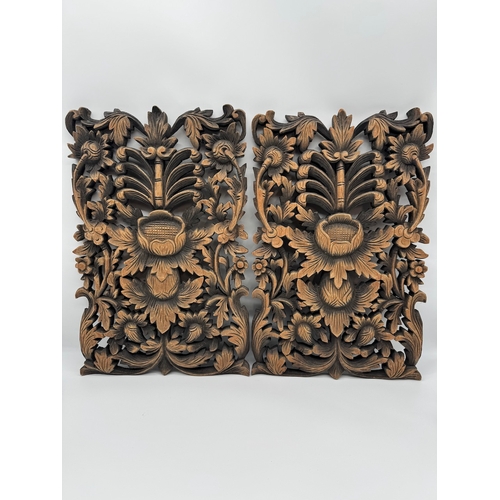 86 - Pair of continental carved wood wall plaques - 11.5