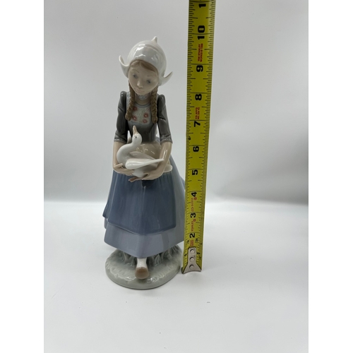 38 - Lladro Dutch Girl Holding Duck Figurine - 10