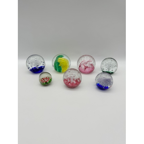 69 - Lot of 7 Studio Glass paperweights