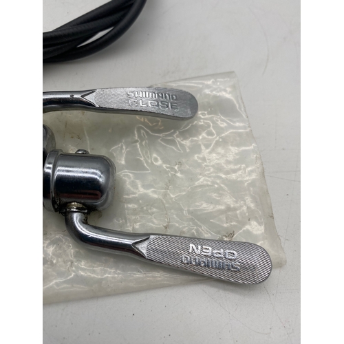 106 - Shimano Deore Bike parts inc handle bars, cassette, brake lever