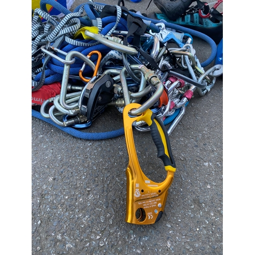 154 - Large collection of rock climbing / safety equipment.