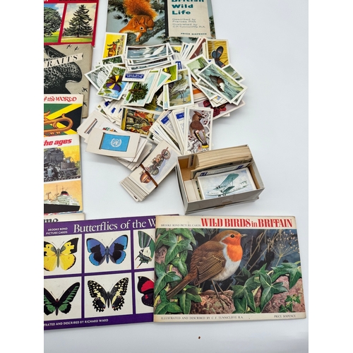 101 - Quantity of vintage cigarette cards in albums and loose various subjects