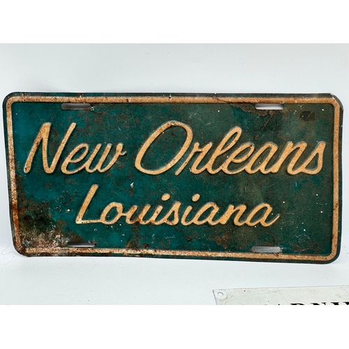 102 - Vintage American New Orleans Louisiana Booster License Plate + two other metal signs