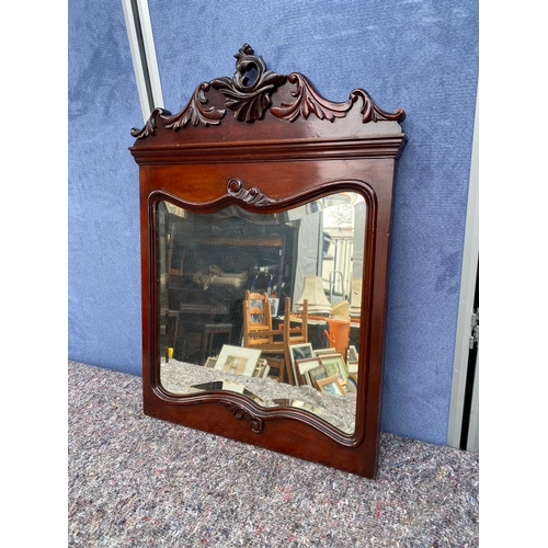 488 - Ornate mahogany framed mirror. 

Dimensions - 20.5