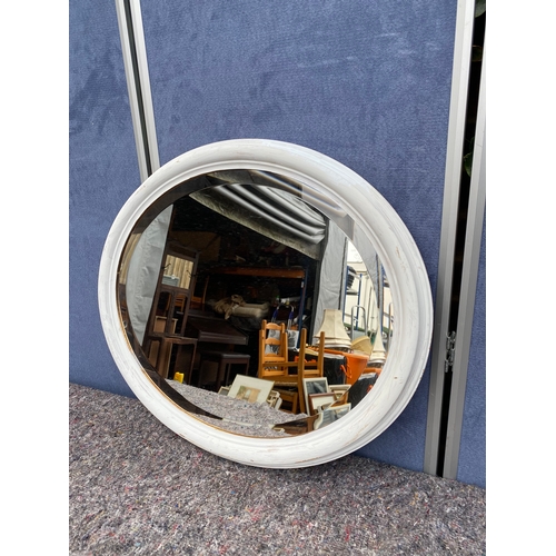 489 - Oval shaped bevelled edge mirror

Dimensions - 27.5