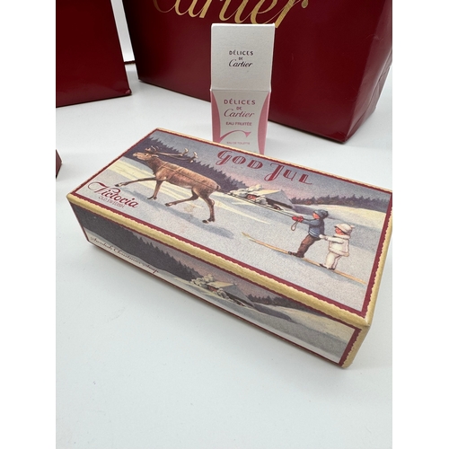 3 - Two Cartier Gift Bags with products including Delices de Cartier, Le Baiser Du Dragon Perfum, Soaps ... 